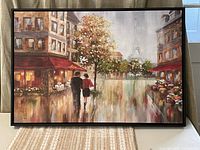 Front view of framed Paris street scene canvas print