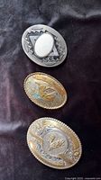 Three belt buckles overview