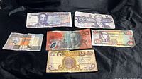 All six banknotes laid out for overview