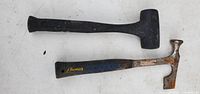 Top view of two hammers showing overall design, wear and branding