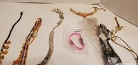 Overall view of assorted jewelry items laid out