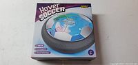 Front of sealed Hover Soccer retail box displaying product image and features