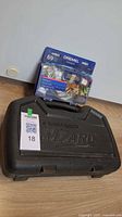 Black & Decker Wizard carry case with Dremel accessory kit on top