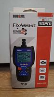 Front of retail box showing Innova FixAssist 3020RS scan tool image