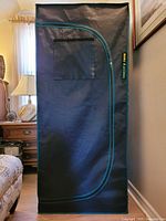 Front view of Mars Hydro grow tent showing curved zipper door and brand label