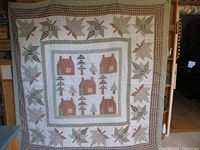 Full view of quilt hanging, showing overall pattern and size
