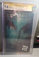 Front of CGC slab showing comic cover, 9.8 grade label, yellow Signature Series tag