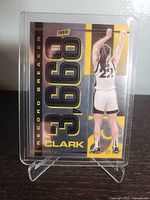 Front of Panini Caitlin Clark Record Breaker insert card in plastic sleeve