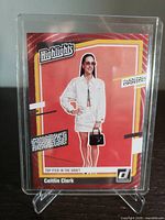 Front of Caitlin Clark red Target exclusive parallel card in plastic holder