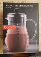 Front of retail box showing Bodum Chocolatiere chocolate jug