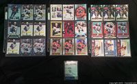 Overview of two binder pages with 18 cards plus one encased card