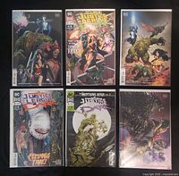 Six Justice League Dark 2018 comics displayed front covers