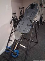 Full view of Teeter inversion table on folding frame