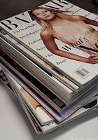 Stack of Harper’s Bazaar magazines showing spine thickness and top cover