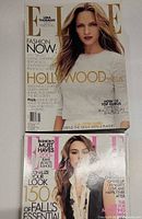 Two Elle magazines, top Hollywood Issue with Uma Thurman, bottom fall essentials issue