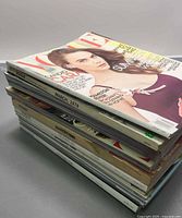 Stack of Vogue magazines showing spines with March 1978 and other dates
