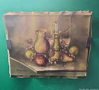 Full view of signed oil painting on loose canvas