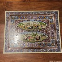 Full view of Persian miniature style print showing border and two hunting scenes