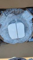 Boxed chandelier parts with glass prism ring protected by wrap