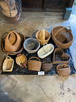 Overhead view of all 12 wicker and rattan baskets laid out on floor