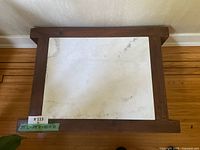 Top view showing marble inset and wood frame