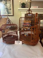 Overview of both birdcages showing size difference and overall design