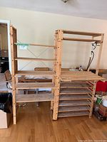 Full view of pine shelving/workbench unit with light and power bar