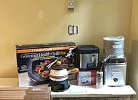 Overview of all appliances on shelf