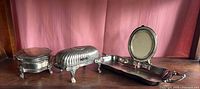 Group shot of jewelry box, roll-top butter dish, oval frame, serving tray