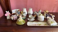 Group shot of all porcelain and ceramic items on wooden surface
