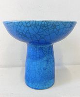 Side view showing crackle glaze and overall form