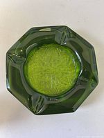 Top view showing octagonal shape, four rests, textured base