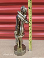 front view showing full height with tape measure