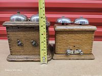 Front view showing height measurement of larger box and terminals