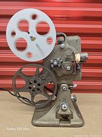 Front view of Keystone projector with two reels attached