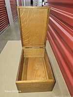 Box open showing interior and lid with third hinge