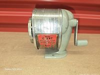 Left-side profile showing faceplate with branding