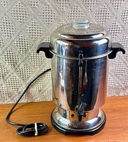 Front view of Charlescraft stainless steel coffee urn with cord