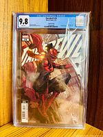 Front view of CGC-encased Daredevil #25 showing full cover and 9.8 grade label