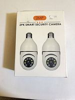 Front of box showing two cameras and 2 MP specification
