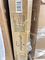 Storkcraft branded carton with model number visible