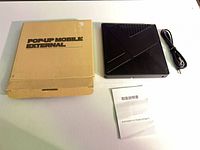 Drive front view with box, cable and manual