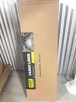 Front of boxed Husky cargo liner