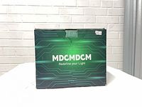 Front of retail box with brand MDCMDCM