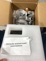 Pump assembly in box with user manual and foam insert