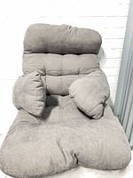 Front view of tufted chaise lounge cushion showing seat and backrest