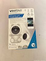 Front of boxed Vivitar Wi-Fi Baby Cam showing features and branding