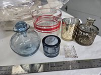 All six items grouped for scale with ruler