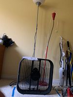 Overview of both floor lamps and box fan together