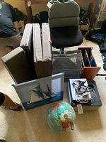 Entire lot grouped together showing chair, foam mat, organizers, globe, printer, art